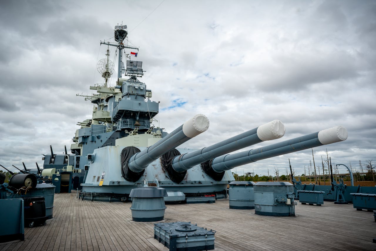 home-hero-1 Powerful battleship USS on display with massive guns in Wilmington, NC.